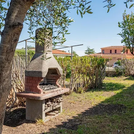 Ferienhaus Trilocale Le Canne 4 Posti Letto Con Giardino E Posto Auto Privato San Teodoro (Sardinia)